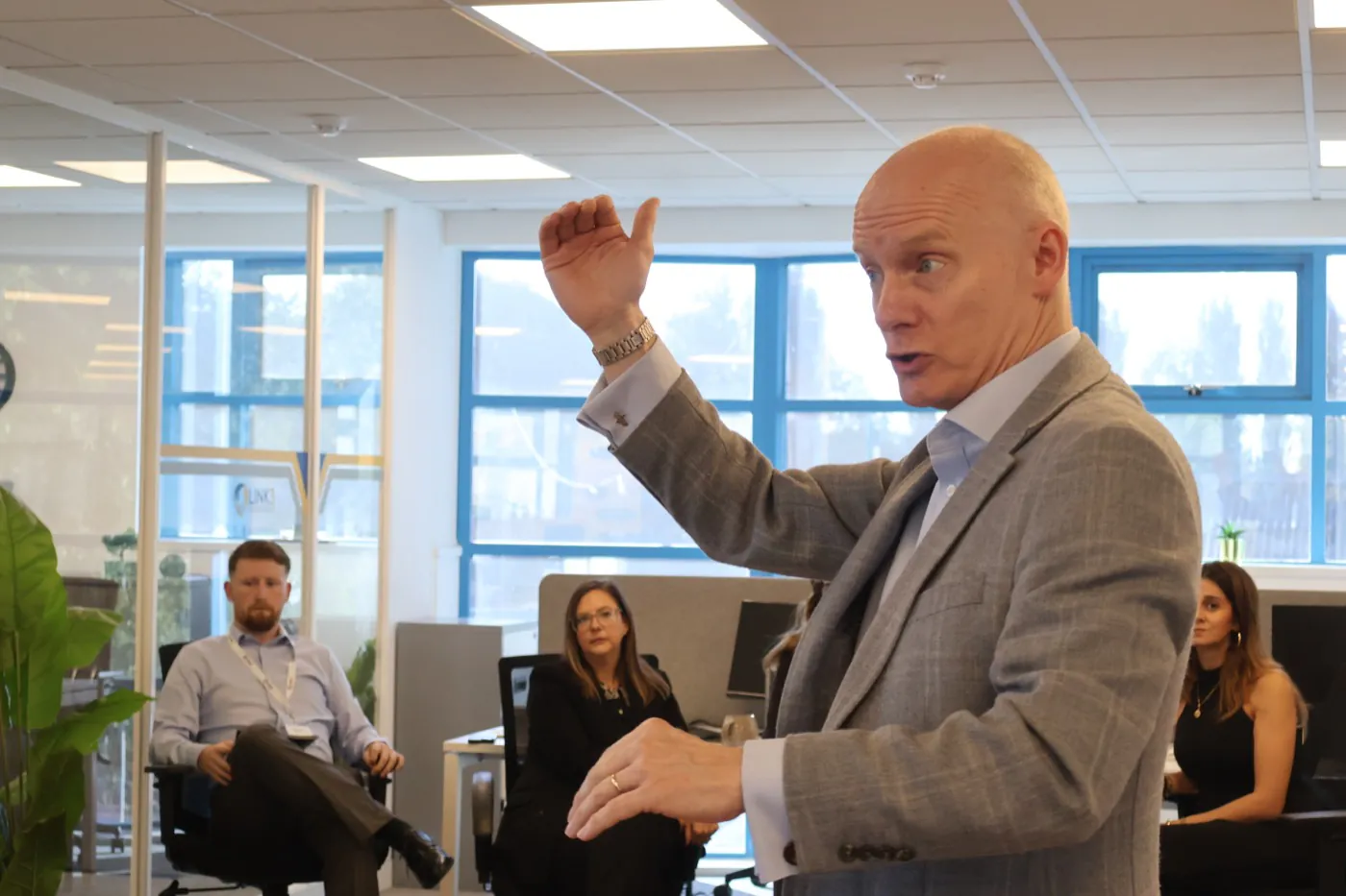 Nick Horton mid-explanation in front of a group of delegates